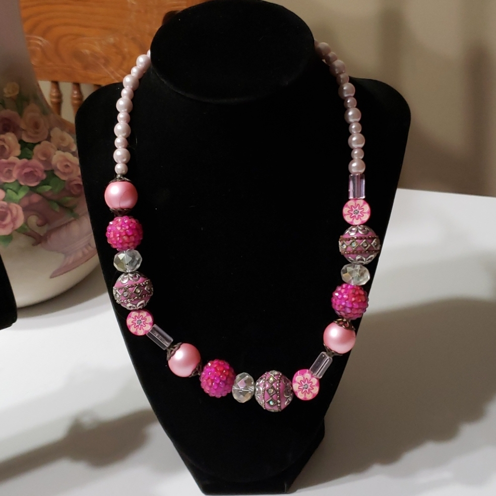 Homemade hot pink necklace and bracelet set
